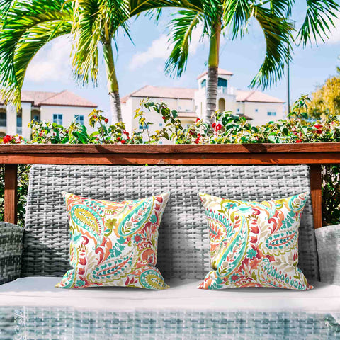 2 throw pillows with chair